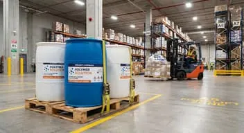 Chemical drums on pallets in a warehouse