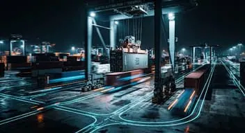 Container yard at night with light trails